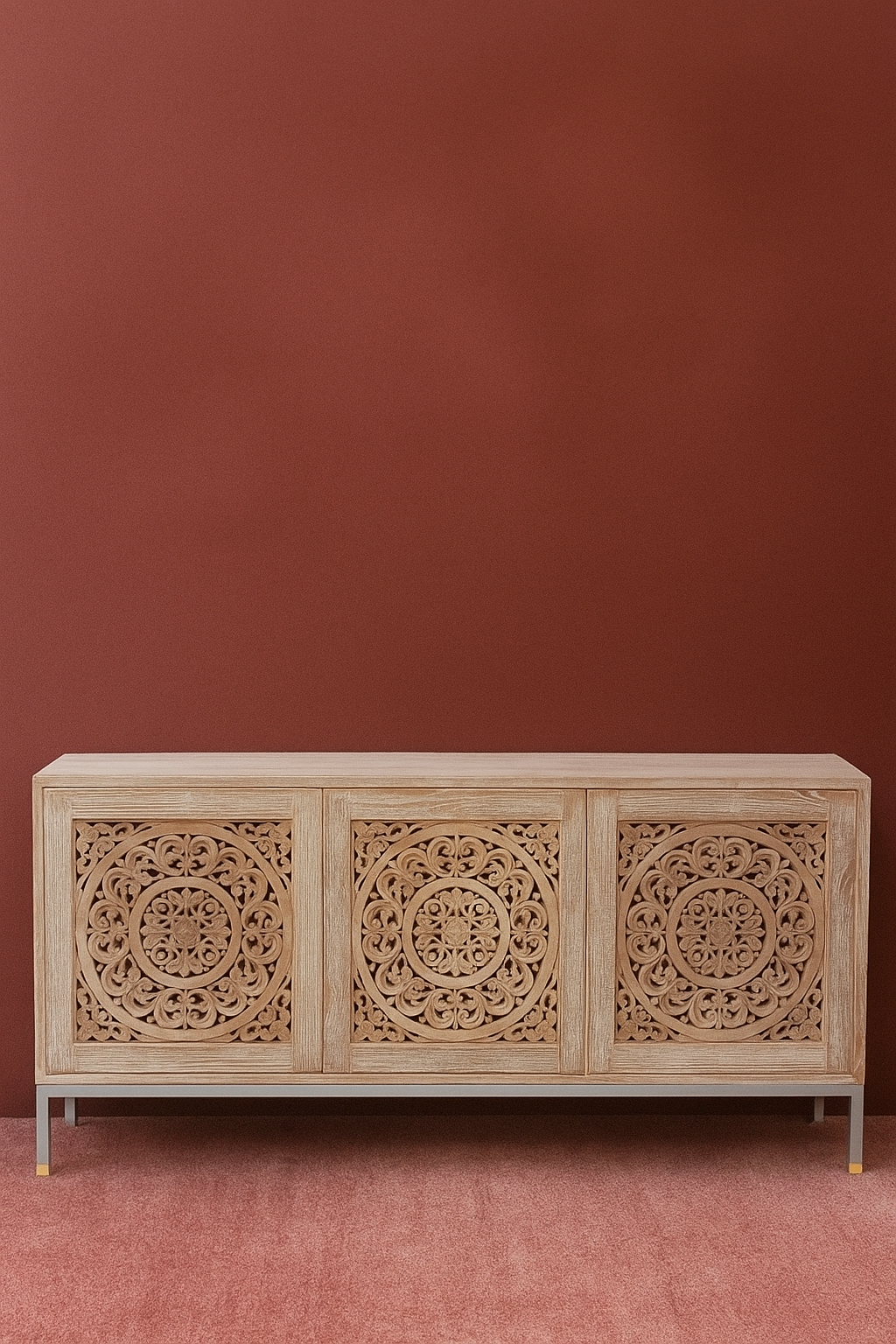 Ndoto Cabinet with handcarved solid teak mandala panels, natural light wash finish, push-to-open doors, minimalist metal base with brass feet, artisan sideboard for boutique hotels, luxury lodges, and high-end interiors.

