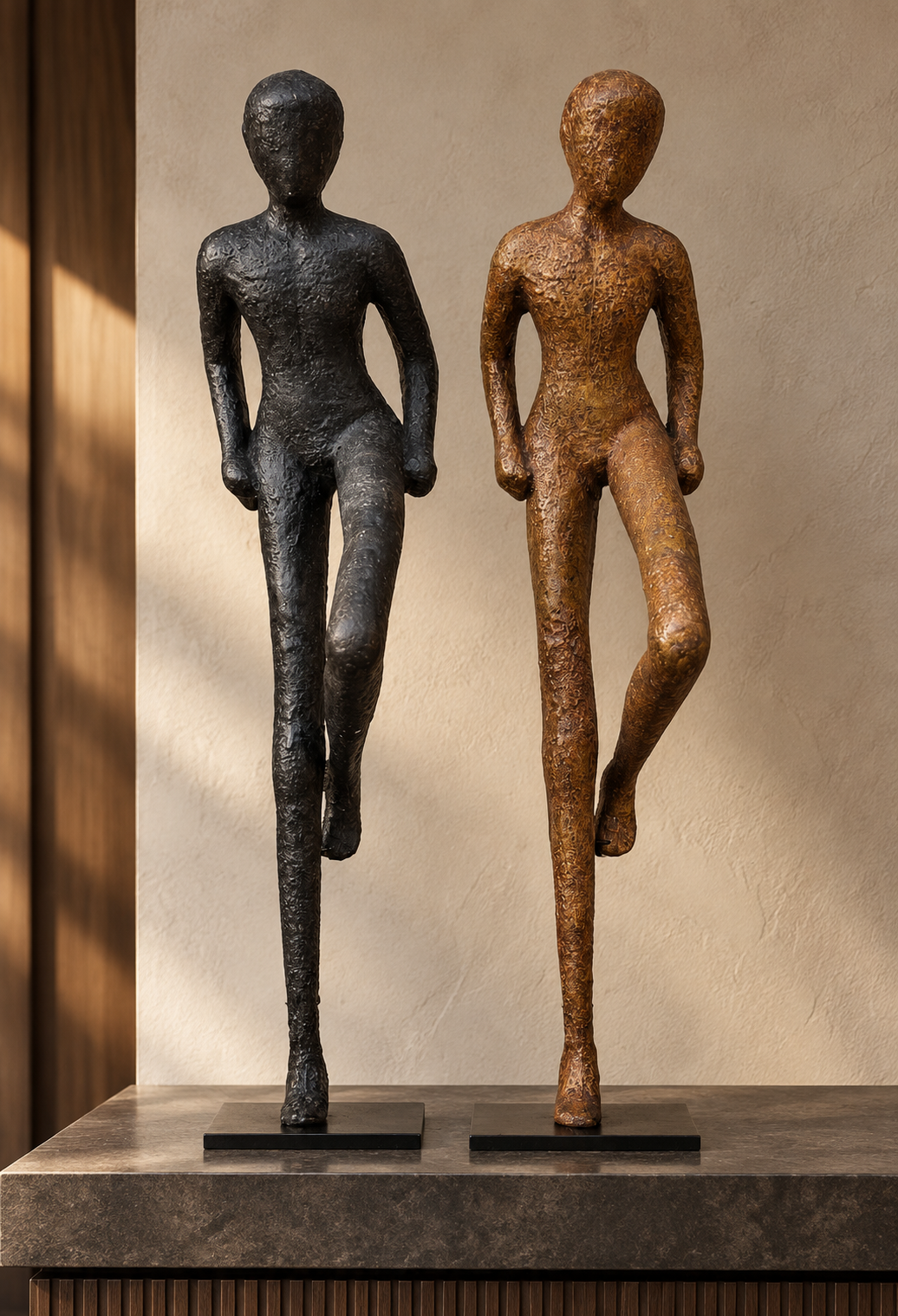 Elongated Striding Man sculpture with a rough, textured surface and forward-stepping pose.