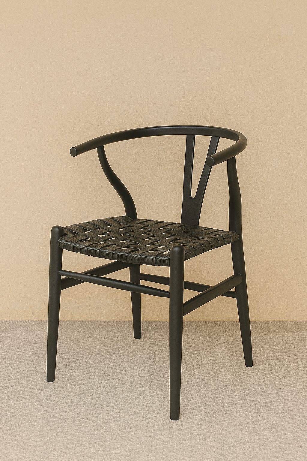 Black wooden dining chair with a curved backrest and handwoven black viro strap seat, set against a soft beige wall and neutral floor