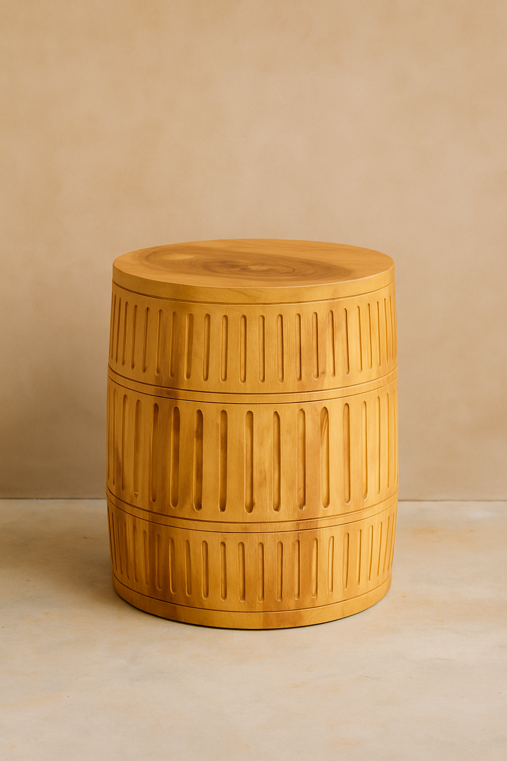 Yanis II Side Table in solid natural teak with barrel shape and carved vertical grooves, handcrafted accent table for homes, lodges, and boutique hotels.

